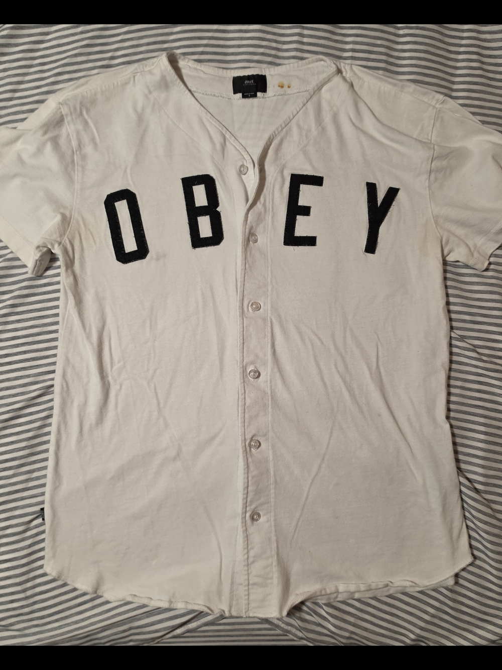 Obey Men's White Button-Front Baseball Tee with Black Lettering